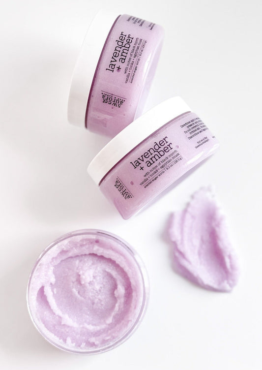 Lavender + Amber gentle exfoliating sugar scrub with open jar showing texture