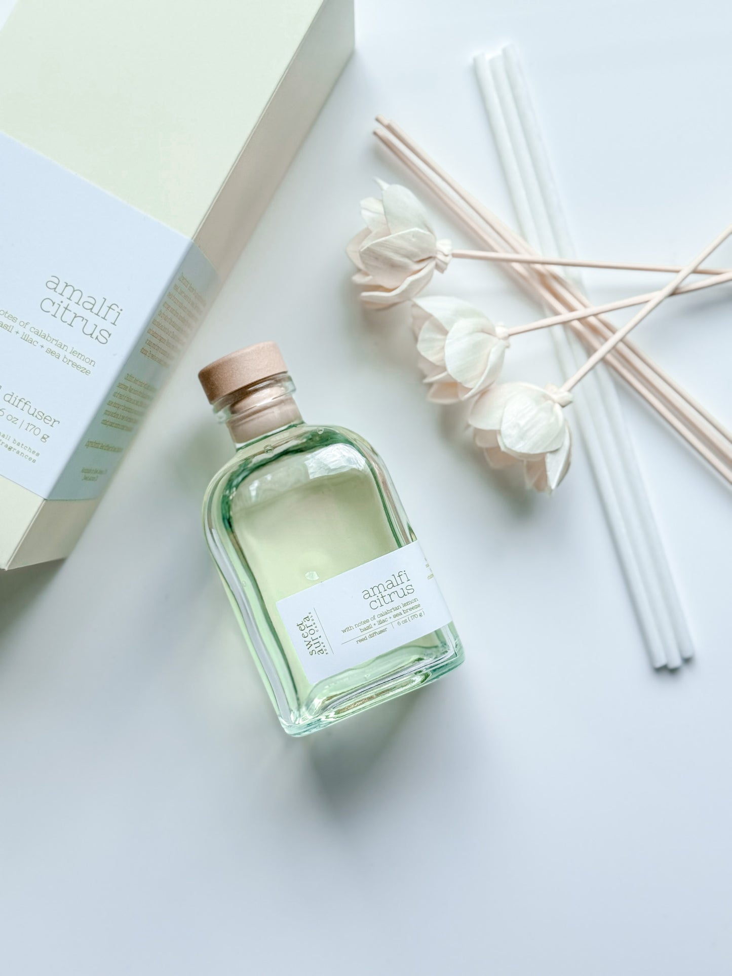 Amalfi Citrus reed diffuser bottle with decorative reeds and gift box