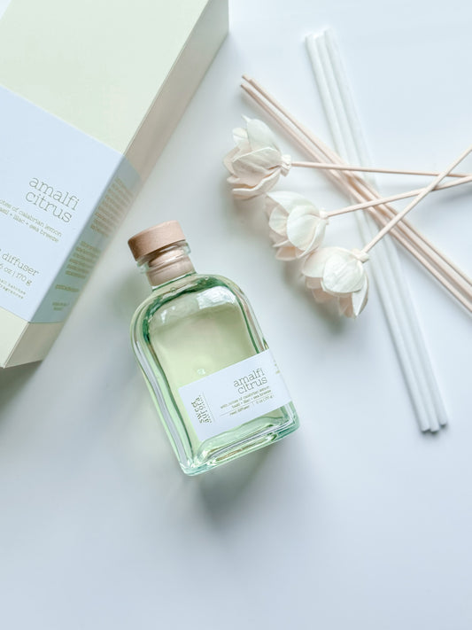 Amalfi Citrus reed diffuser bottle with decorative reeds and gift box