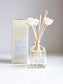 Sea Salt + Orchid reed diffuser with decorative reeds and gift box
