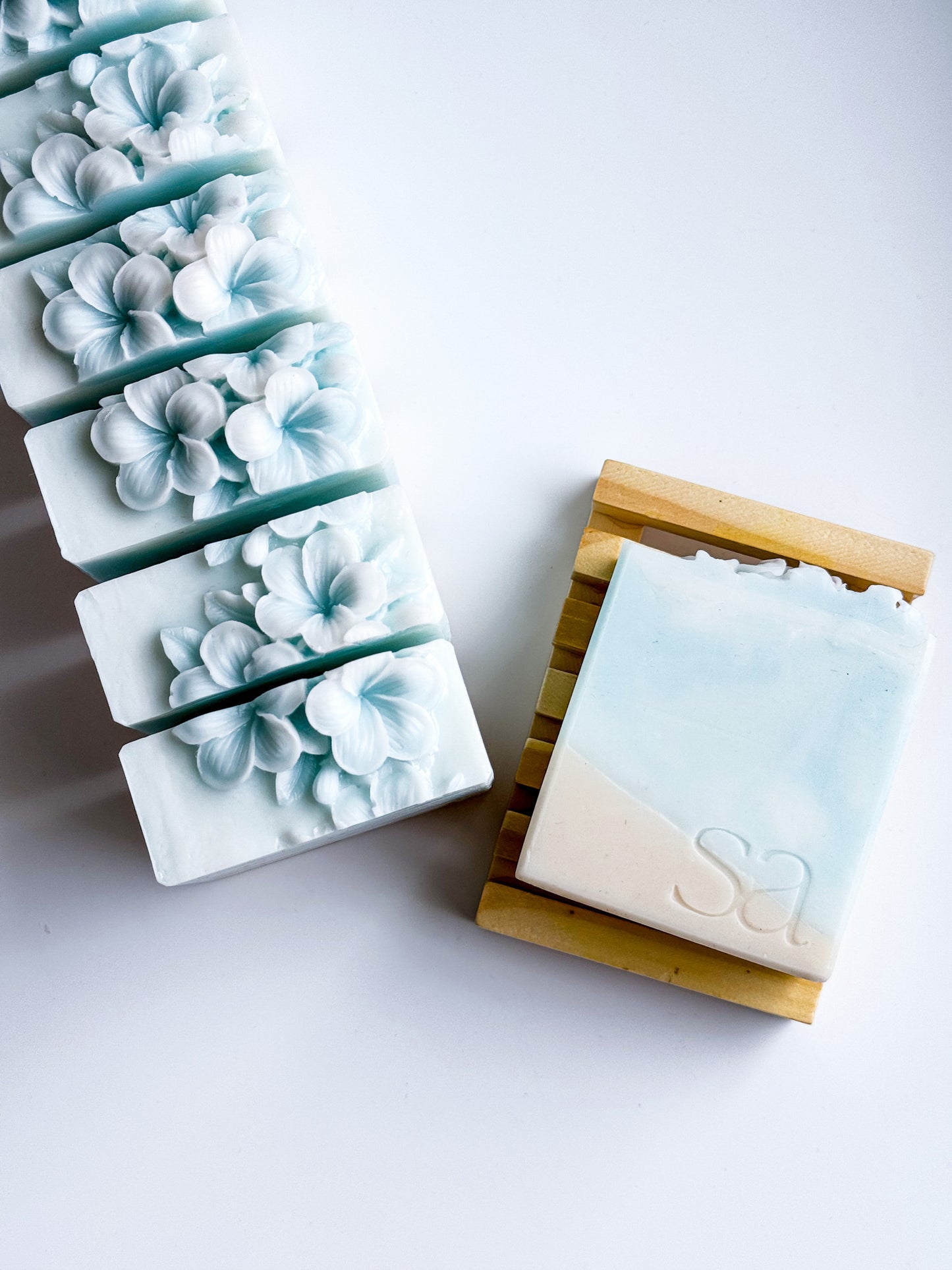 Sea salt and orchid handmade soap bar with ocean wave design and flower topper by Sweet Aurora